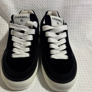 CHANEL Monochrome Lace-Up Sneakers